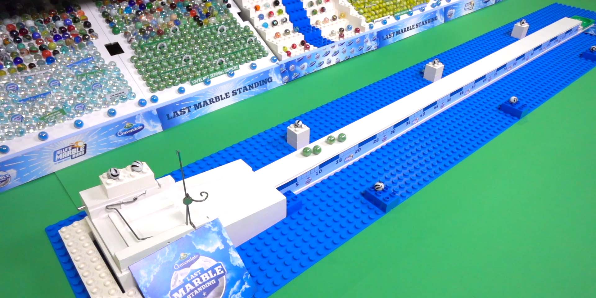 A long, sloped marble track for balancing