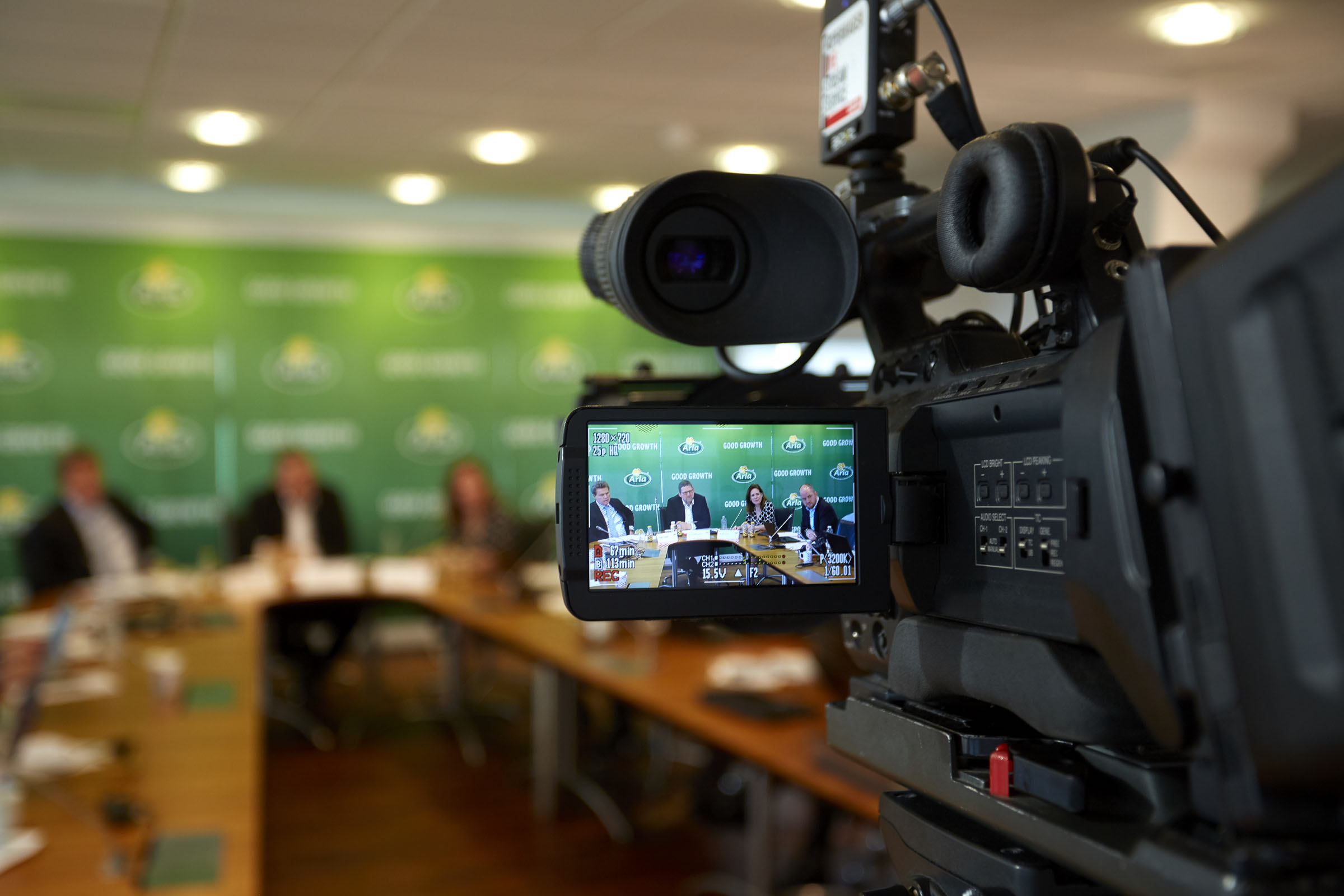 An Arla press meeting seen from the digital viewfinder of a video camera