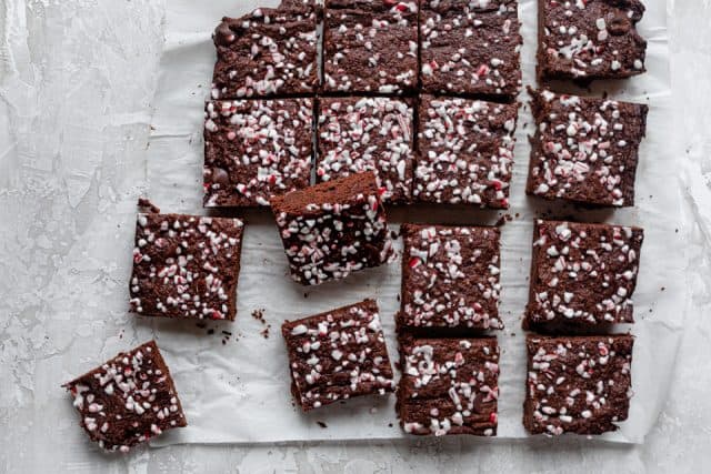 Brownies on parchment paper after they have been cut