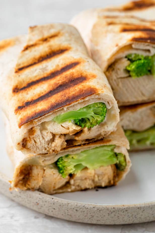 Chicken and broccoli warps on a plate