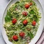 Large plate of zoodles with blistered tomatoes