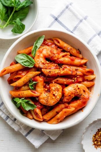 Arrabiata pasta with shrimp in a small pasta bowl