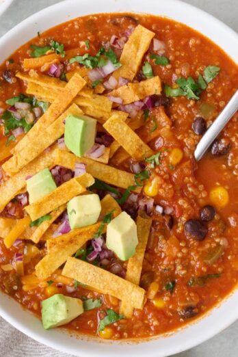 Bowl of vegetarian tortilla soup.