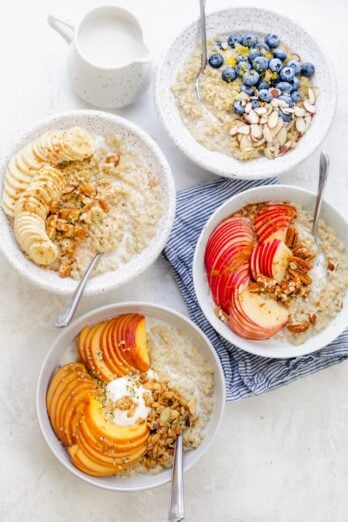 Quinoa oatmeal served with a variety of toppings for breakfast