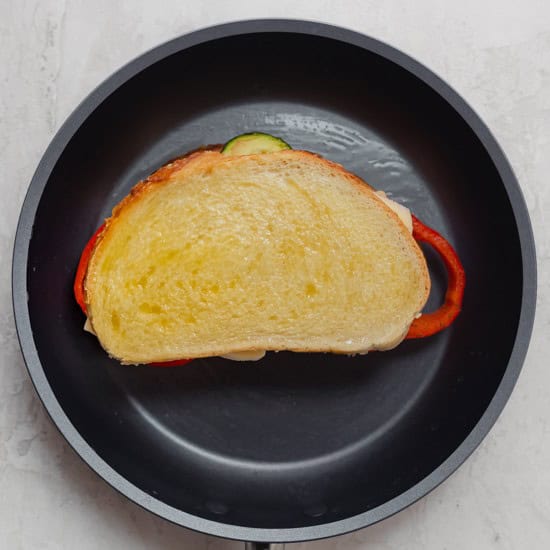 Top slice of bread added.