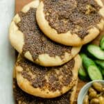 Zaatar Manakish flatbread on a wooden serving board