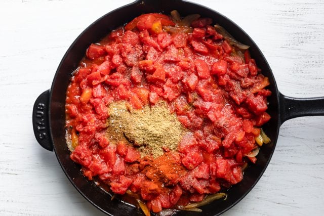 Added spices to the skillet with the tomato sauce
