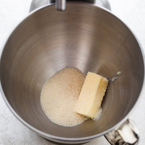 Sugar and butter in a mixer before blending.