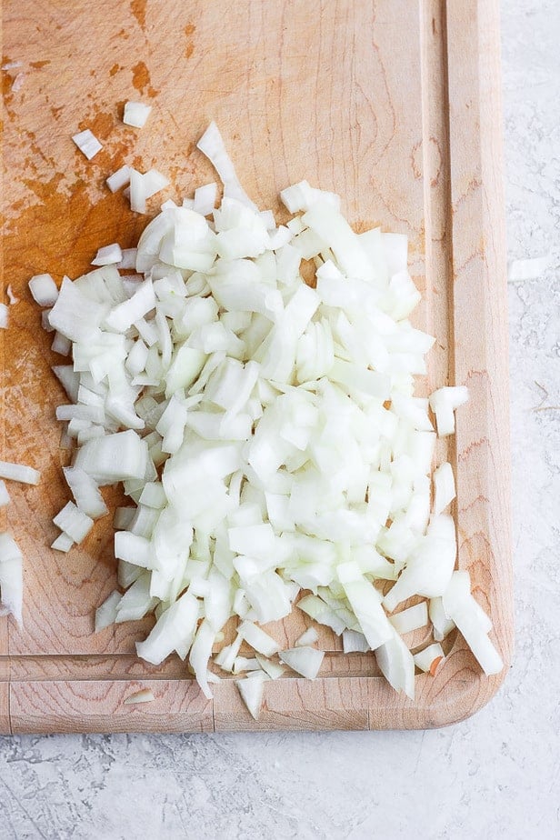 Chopped onions on cutting board