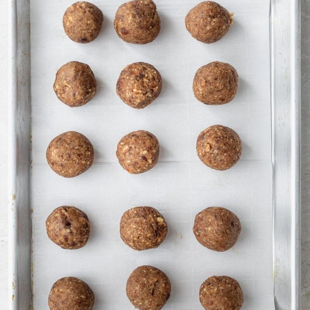 Coconut date balls formed.