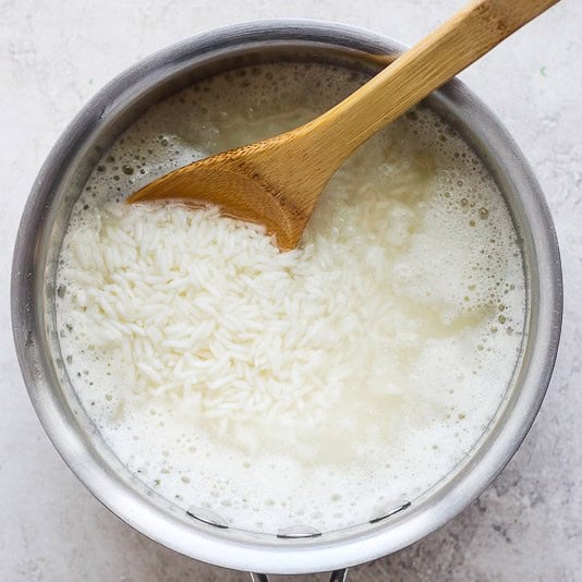 Stirring rice.