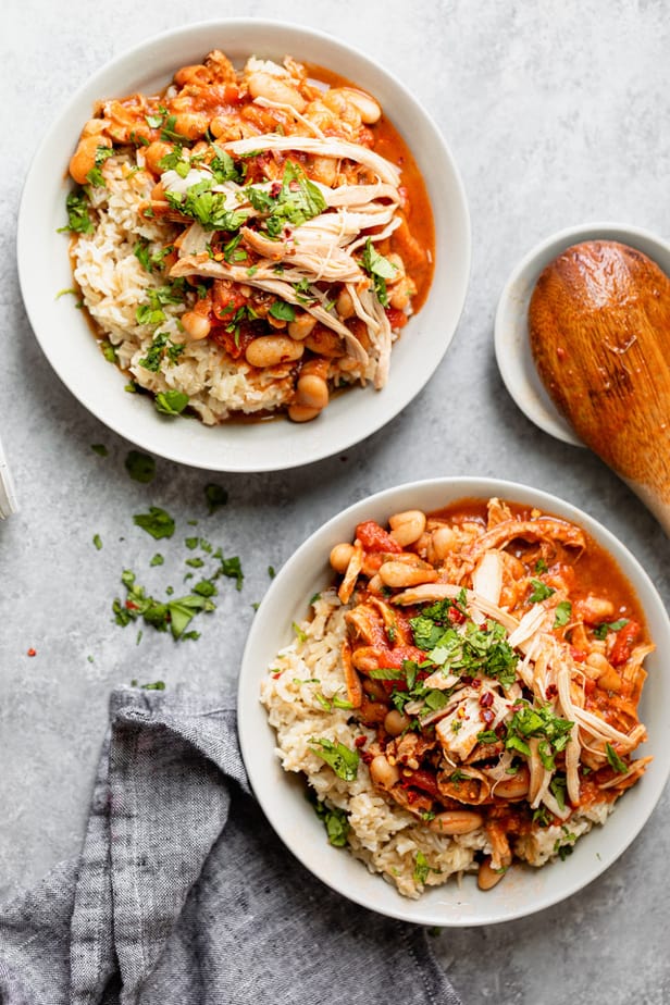 Lebanese bean stew served in two white bowls