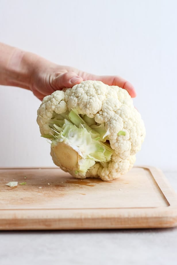 Turning cauliflower on its side before cutting it