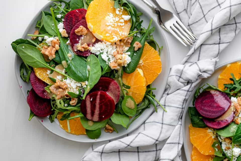 Beet orange salad assembled in a serving bowl.