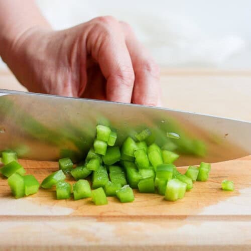 Cutting strips into smaller pieces.