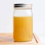 Cooled stock in a glass mason jar