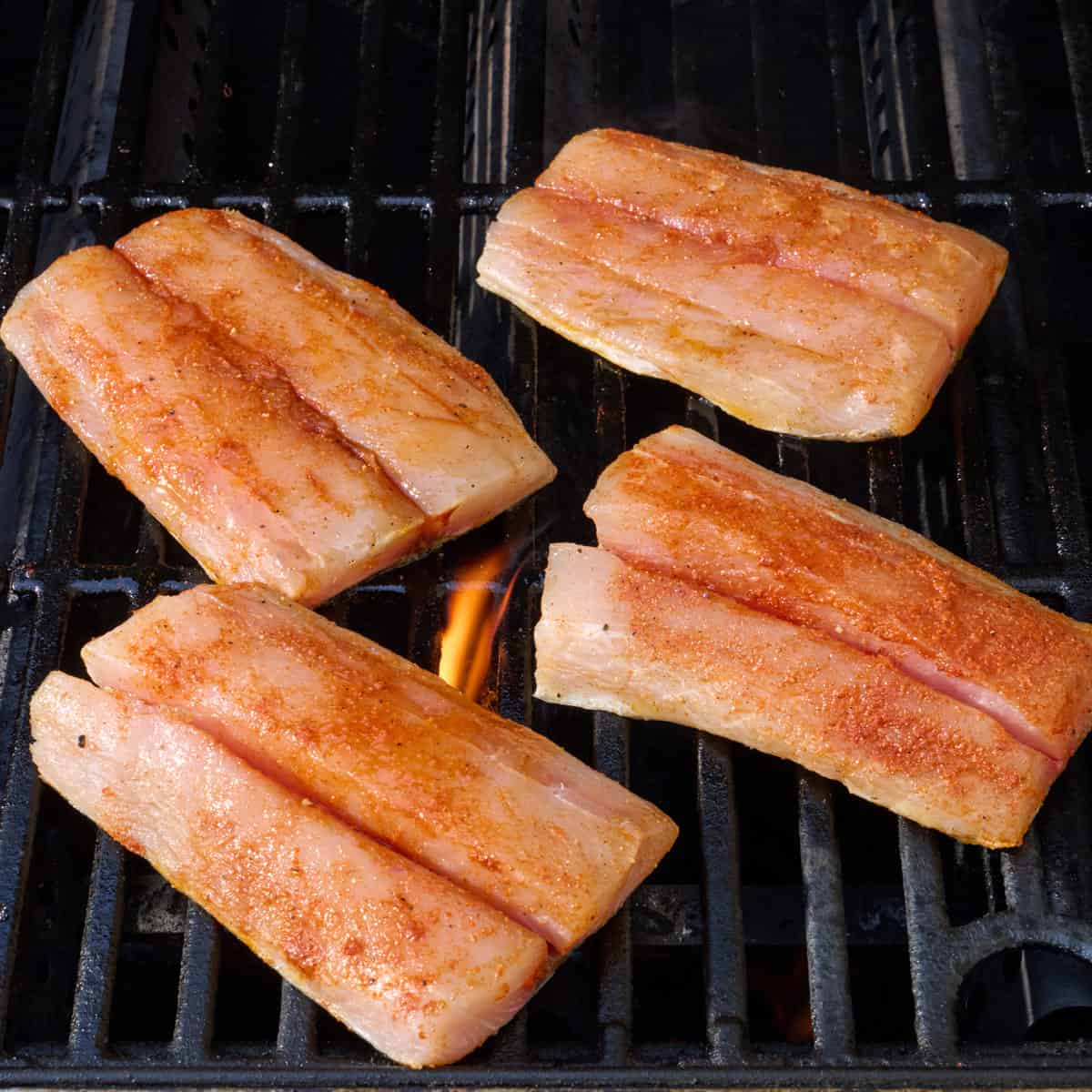 4 fillets on a grill.