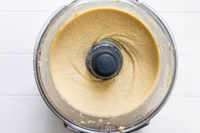 Freshly made hummus in food processor