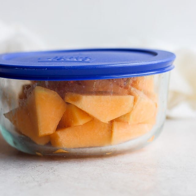 Cut cantaloupe in glass tupperware