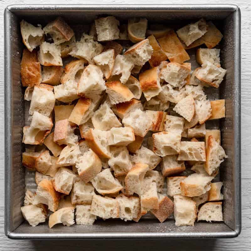 Cut French bread in dish.