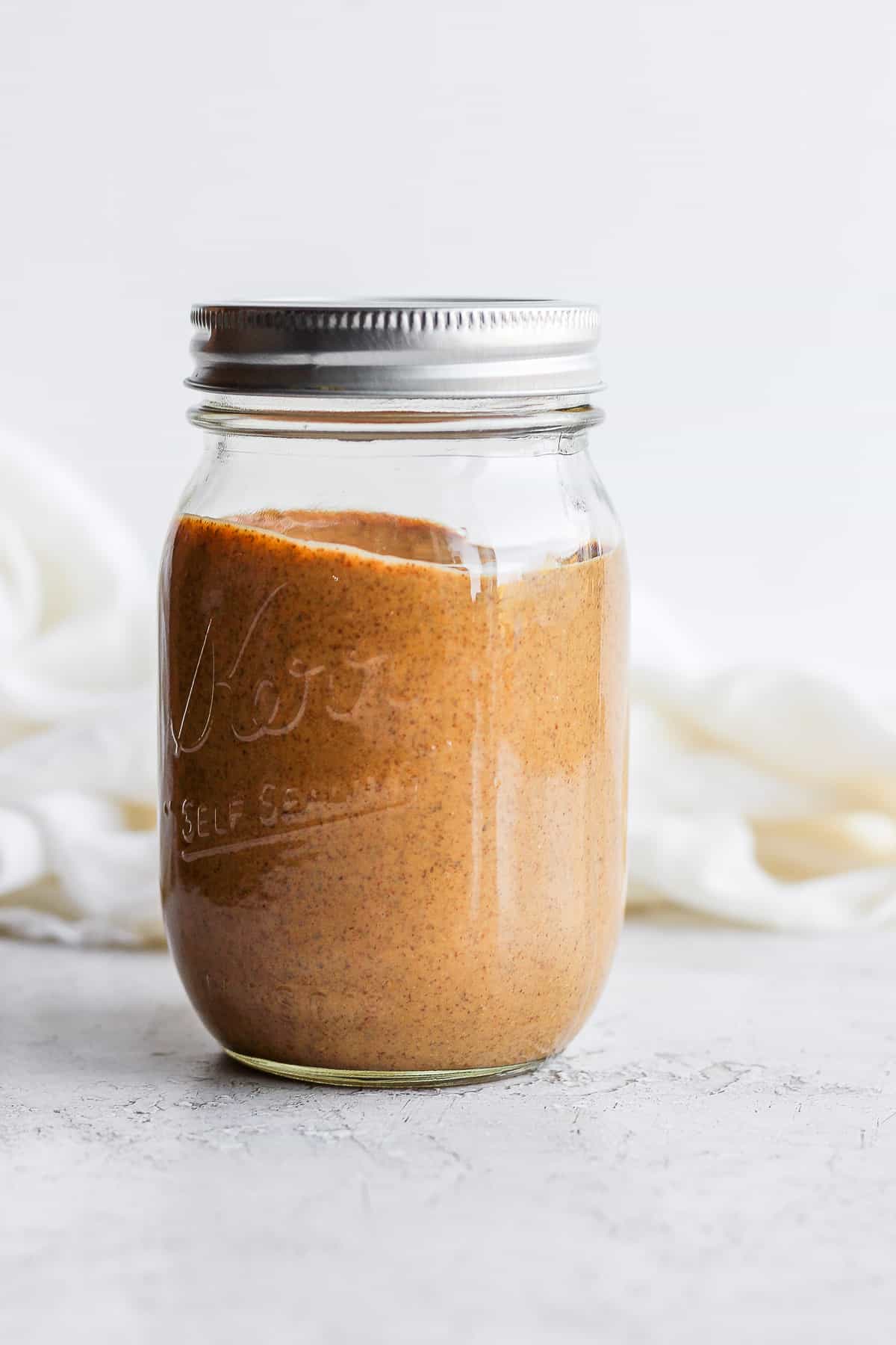 Homemade almond butter in a mason jar