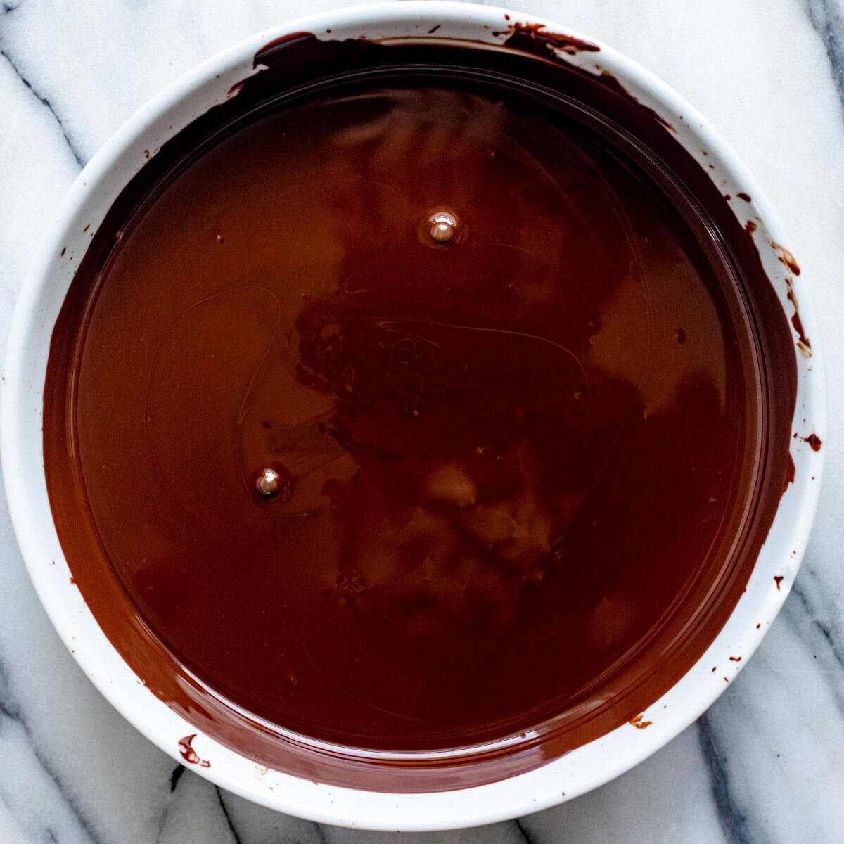 Dark chocolate in a bowl after melting.