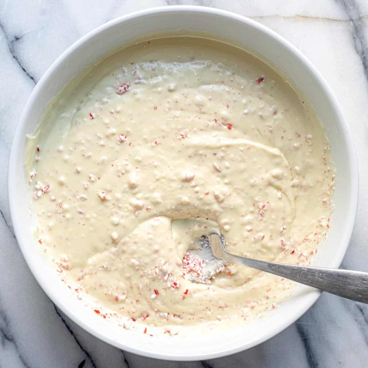Melted white chocolate with peppermint mixed in.