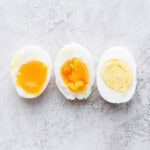 Three halves of boiled eggs laid out.