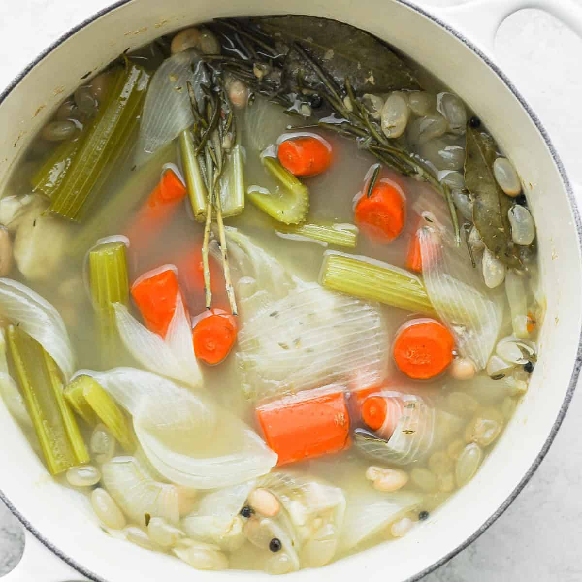 Pot uncovered to cool the vegetable stock.