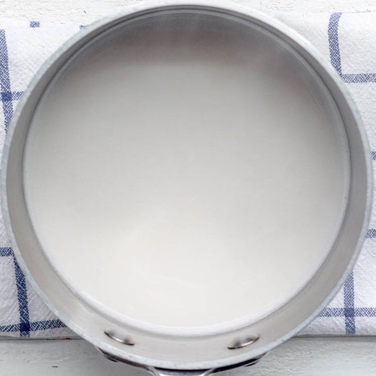 Water, milk and salt combined in a sauce pan.