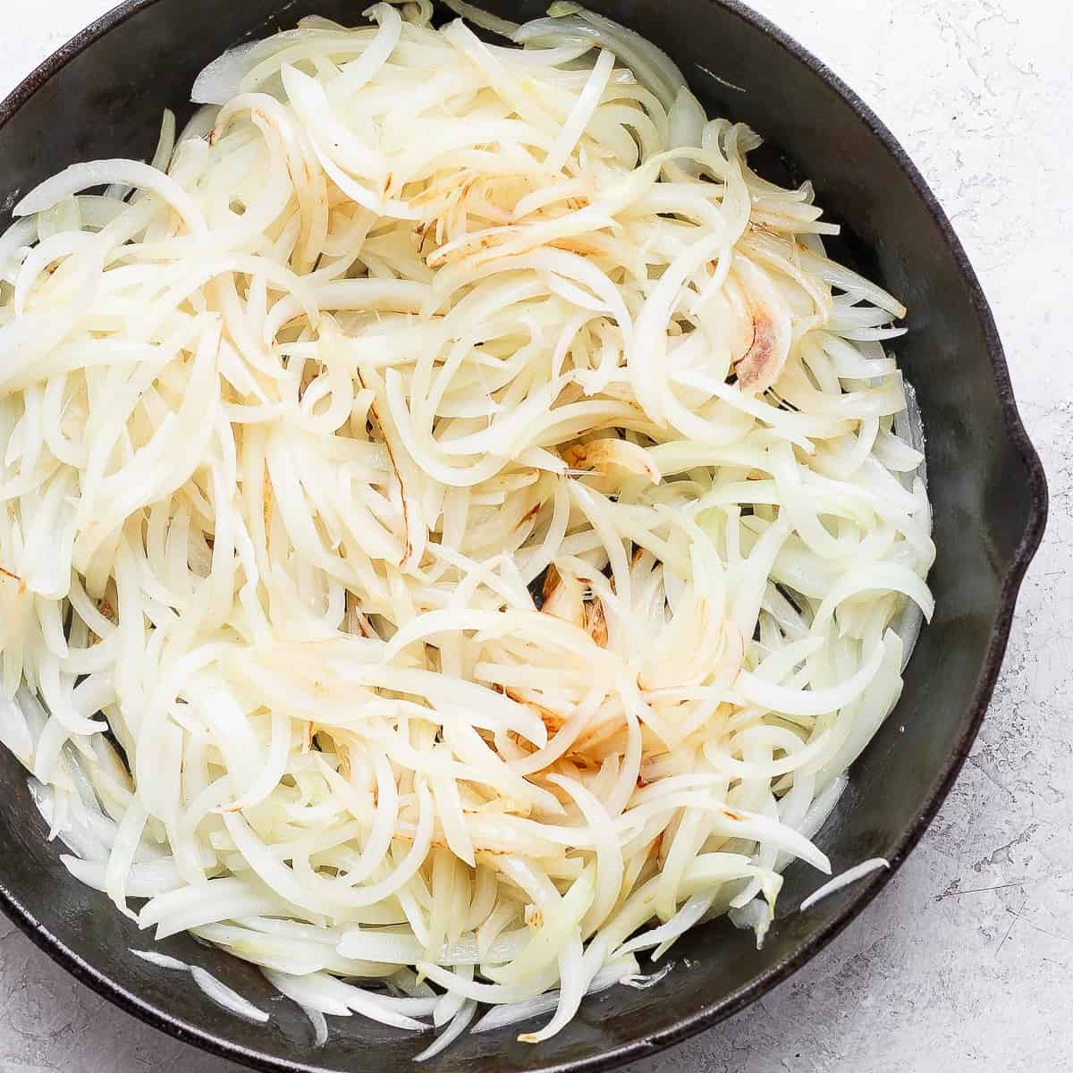 Onions partially caramelized.