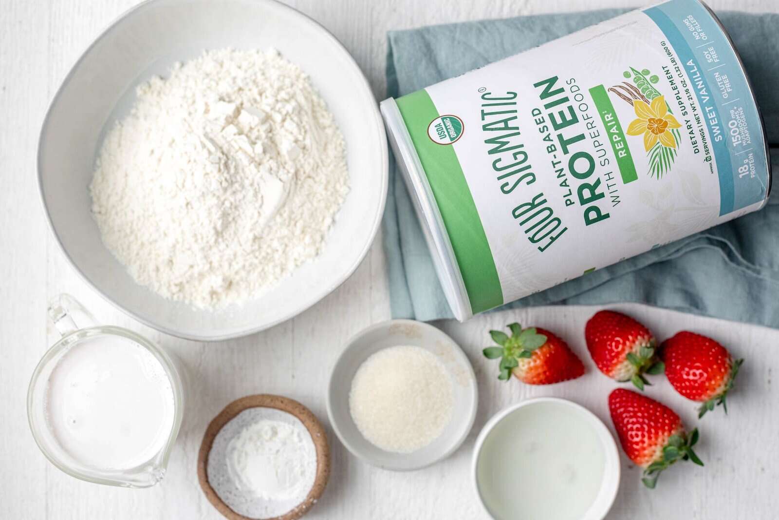Ingredients to make strawberries and cream protein crepes.