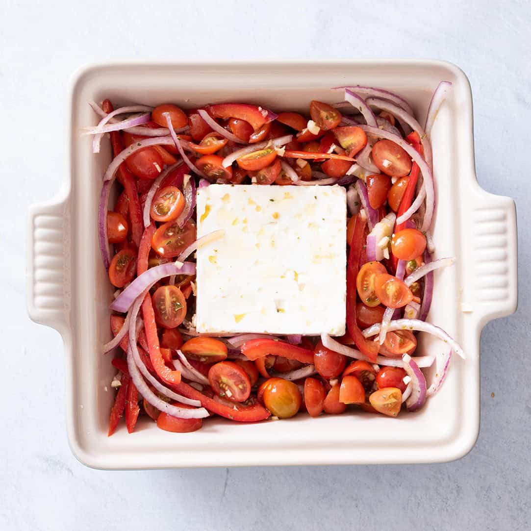 In baking dish before baking, with feta in the middle.