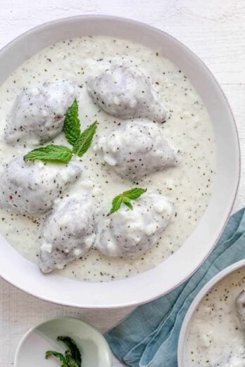 Kibbeh bi labanieh - traditional Middle Eastern dish in a large bowl of yogurt sauce