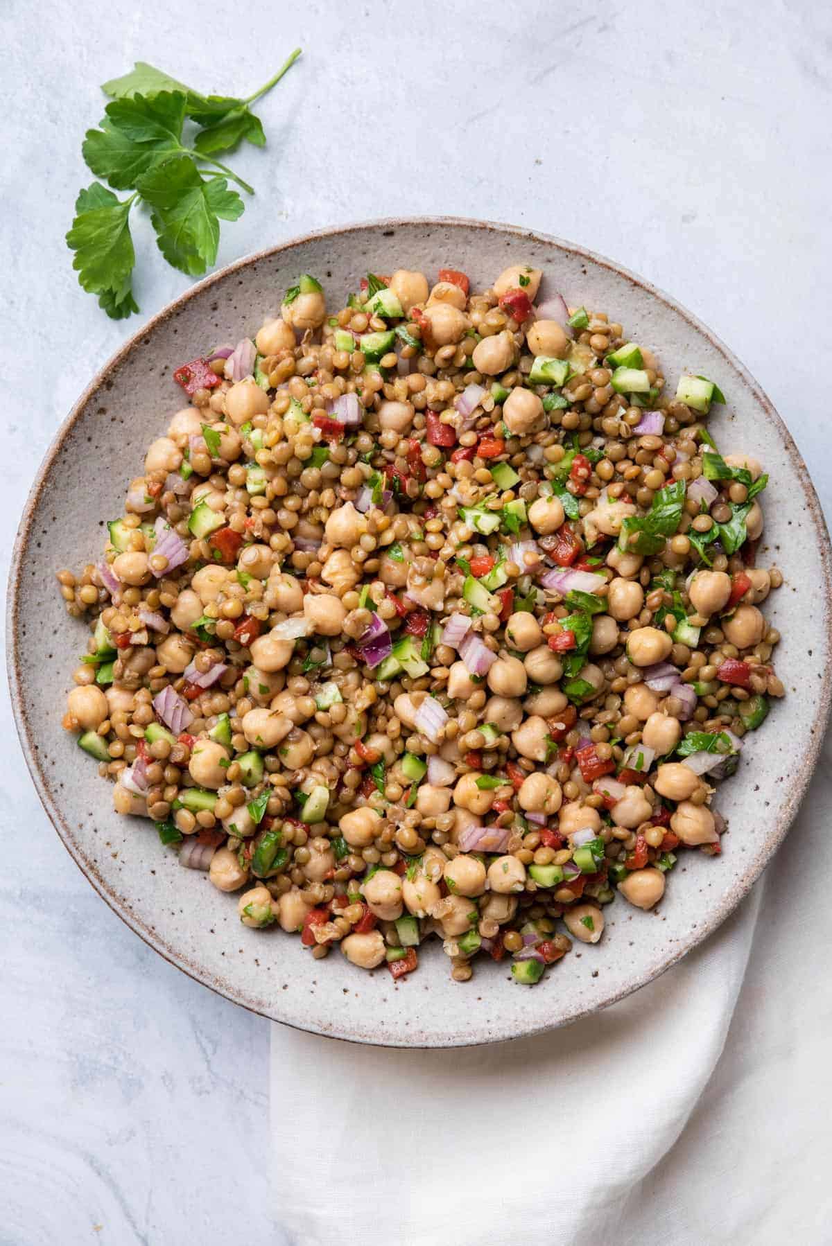 Large bowl of lentil salad made with chickpeas