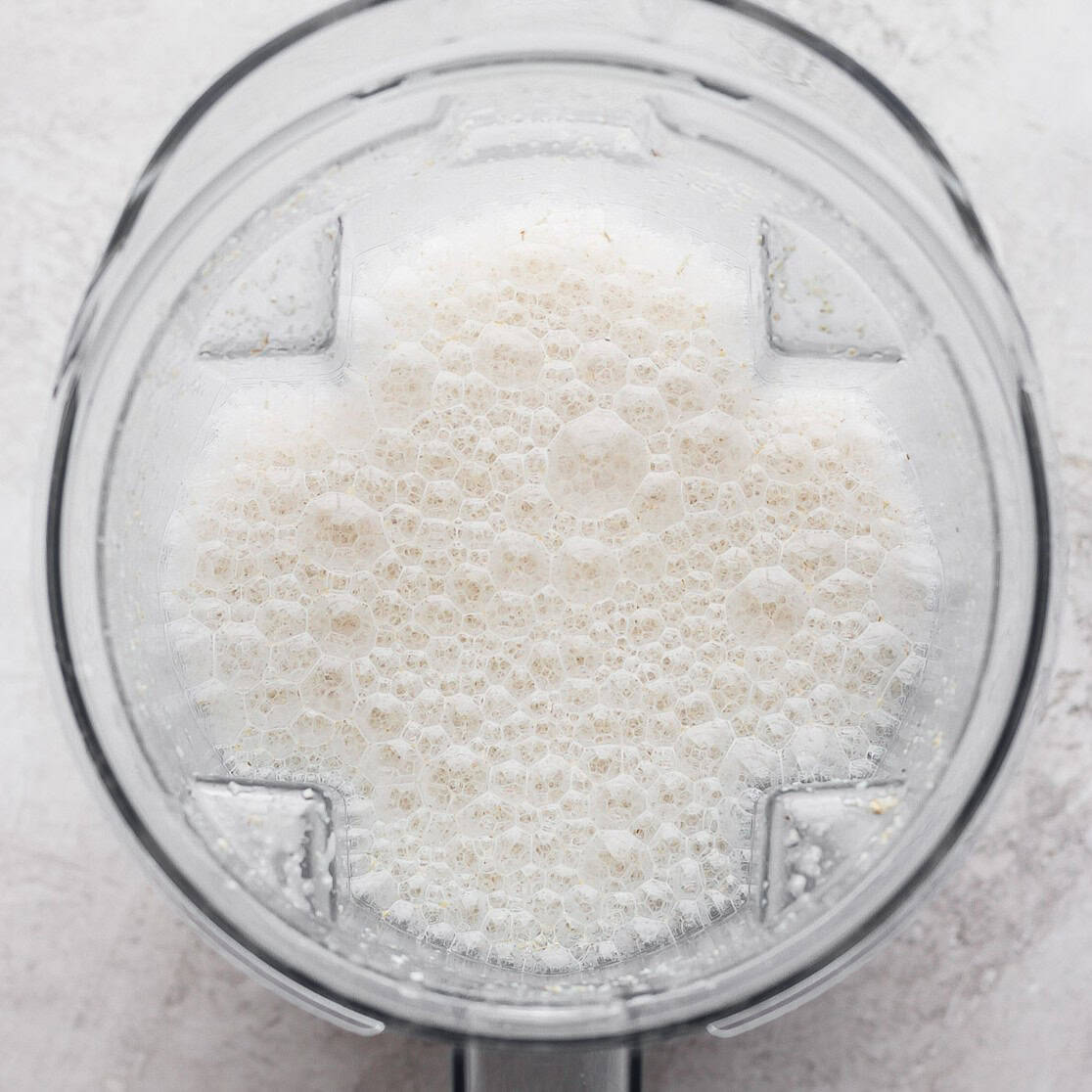 Oat milk mixture in blender after blending.