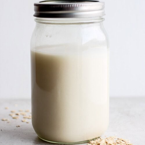 Oat milk in a glass jar.