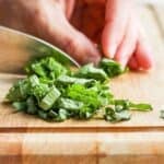 Knife slicing towards the end.