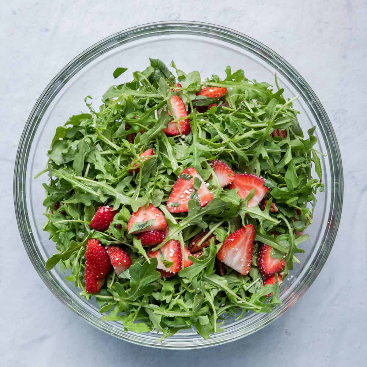 Salad ingredients tossed.