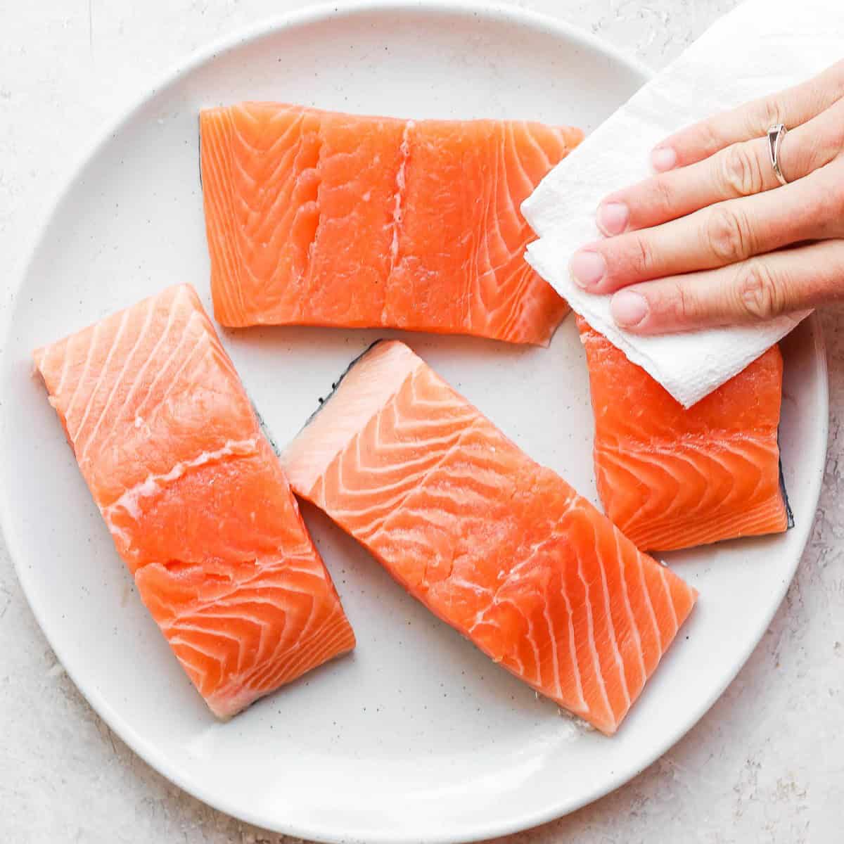 Pat salmon dry with paper towel.
