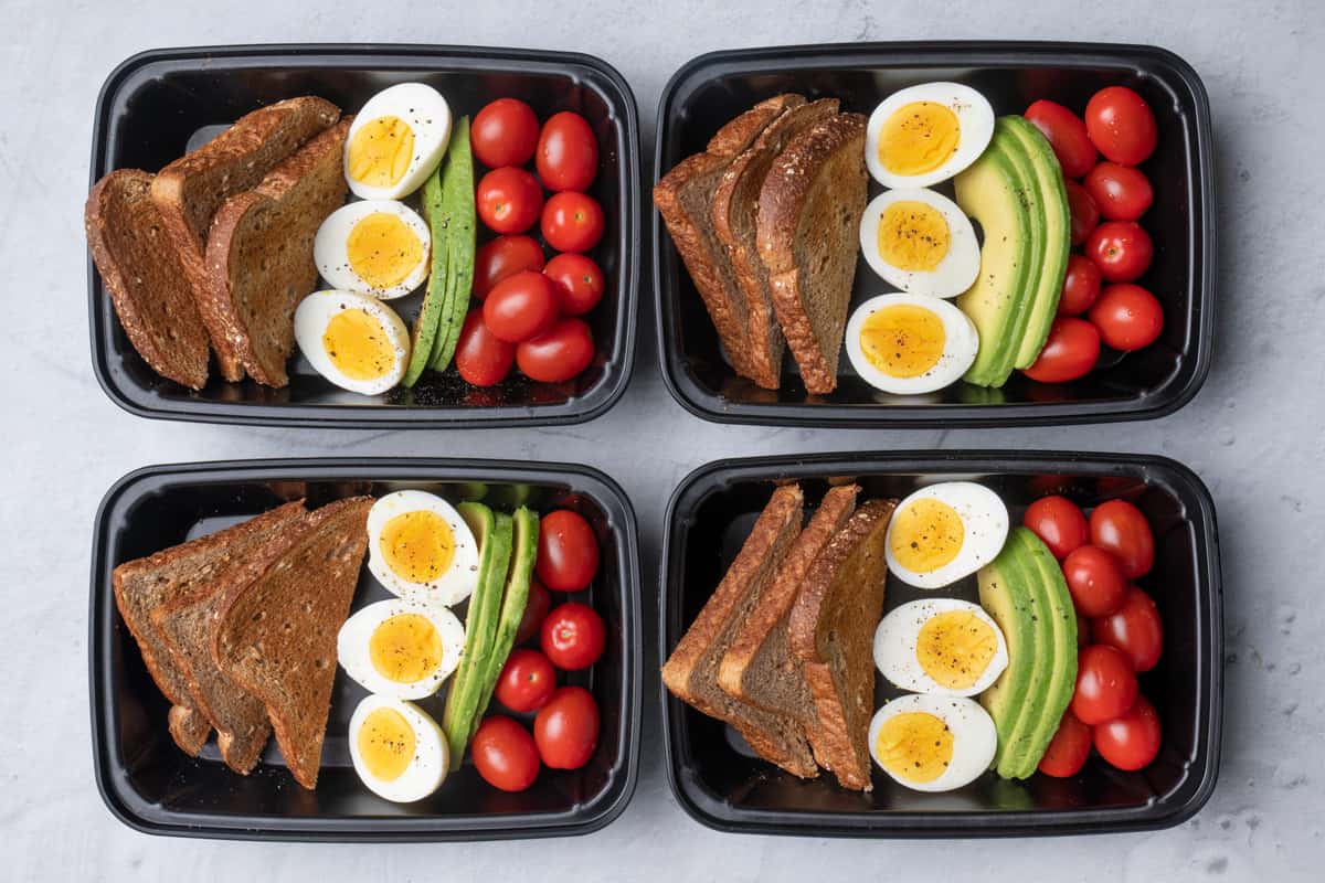 4 containers of Avocado and Egg Breakfast Meal Prep