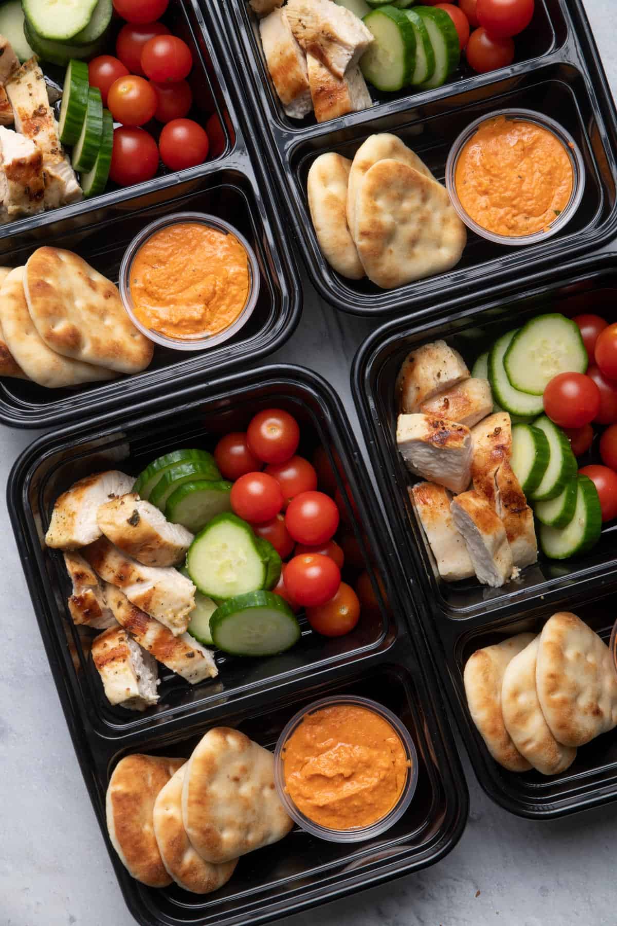 Meal prepped grilled chicken with hummus and veggies