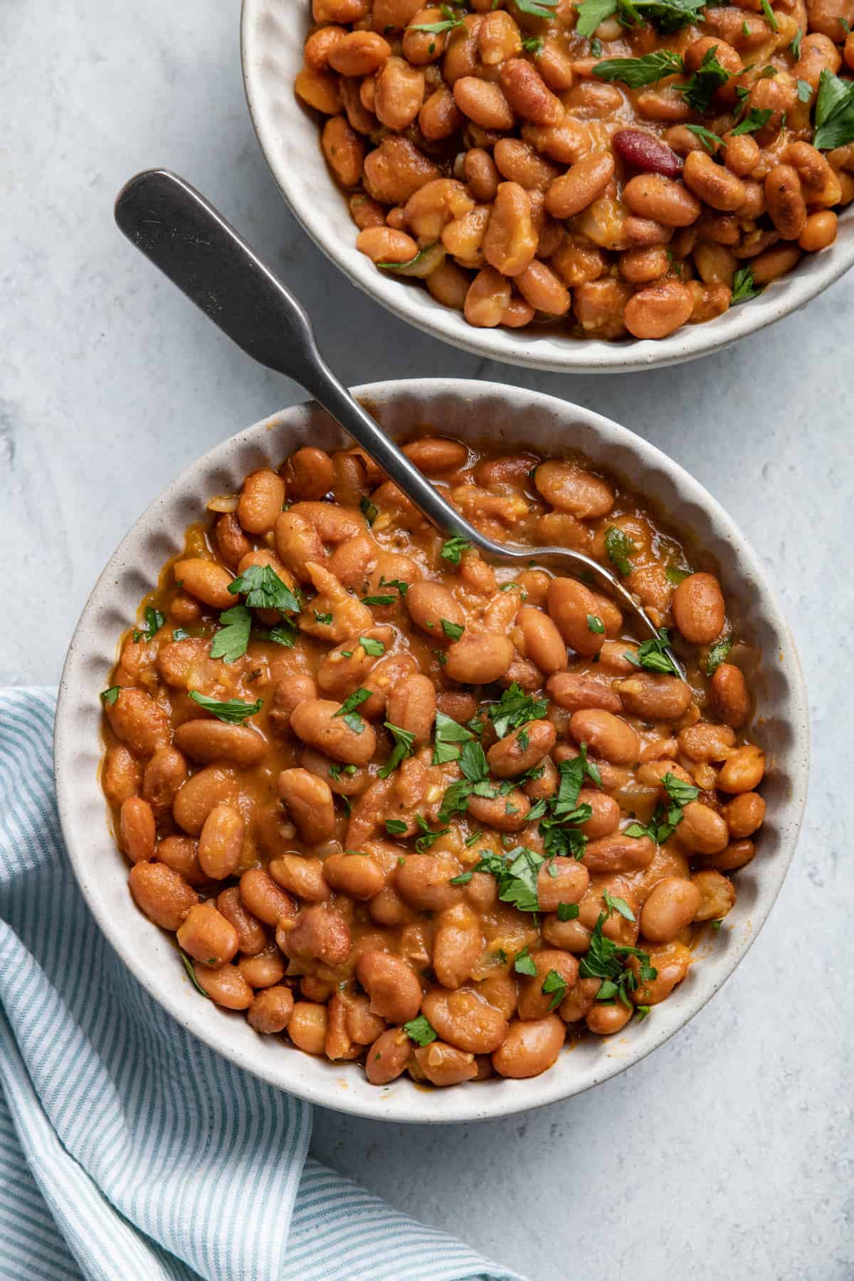 Two bowls of baked beans