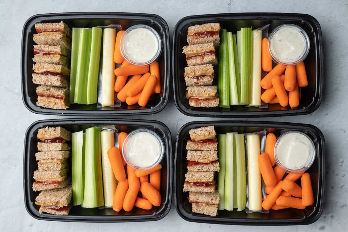 PB&J meal prep containers with veggies
