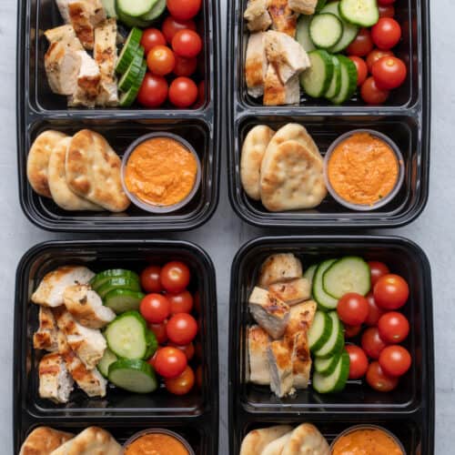 Grilled chicken and hummus meal prep containers