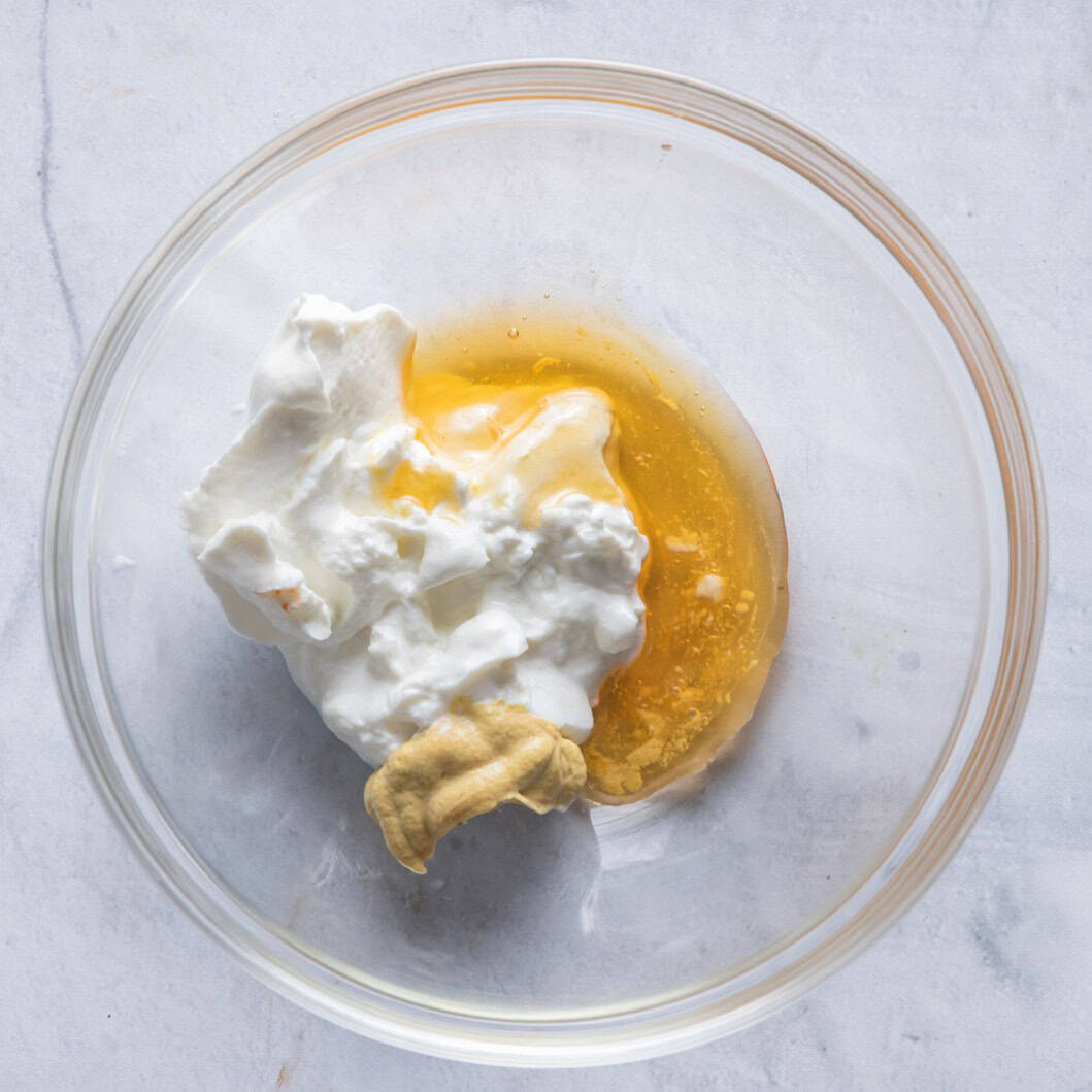 Shallow bowl with marinade alone.