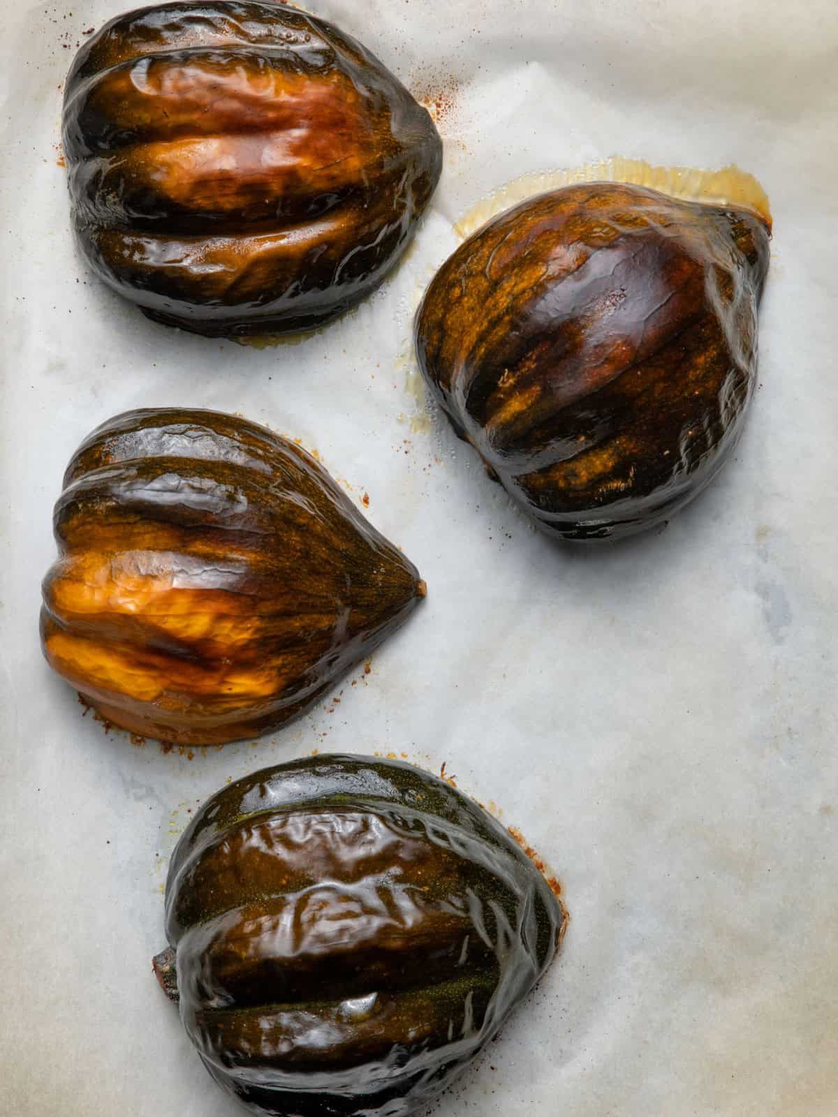 Acorn squash cut side down after cooking.