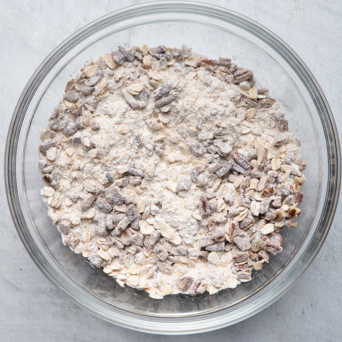 Sugar, cornstarch, lemon juice and cinnamon added on top and stirred.