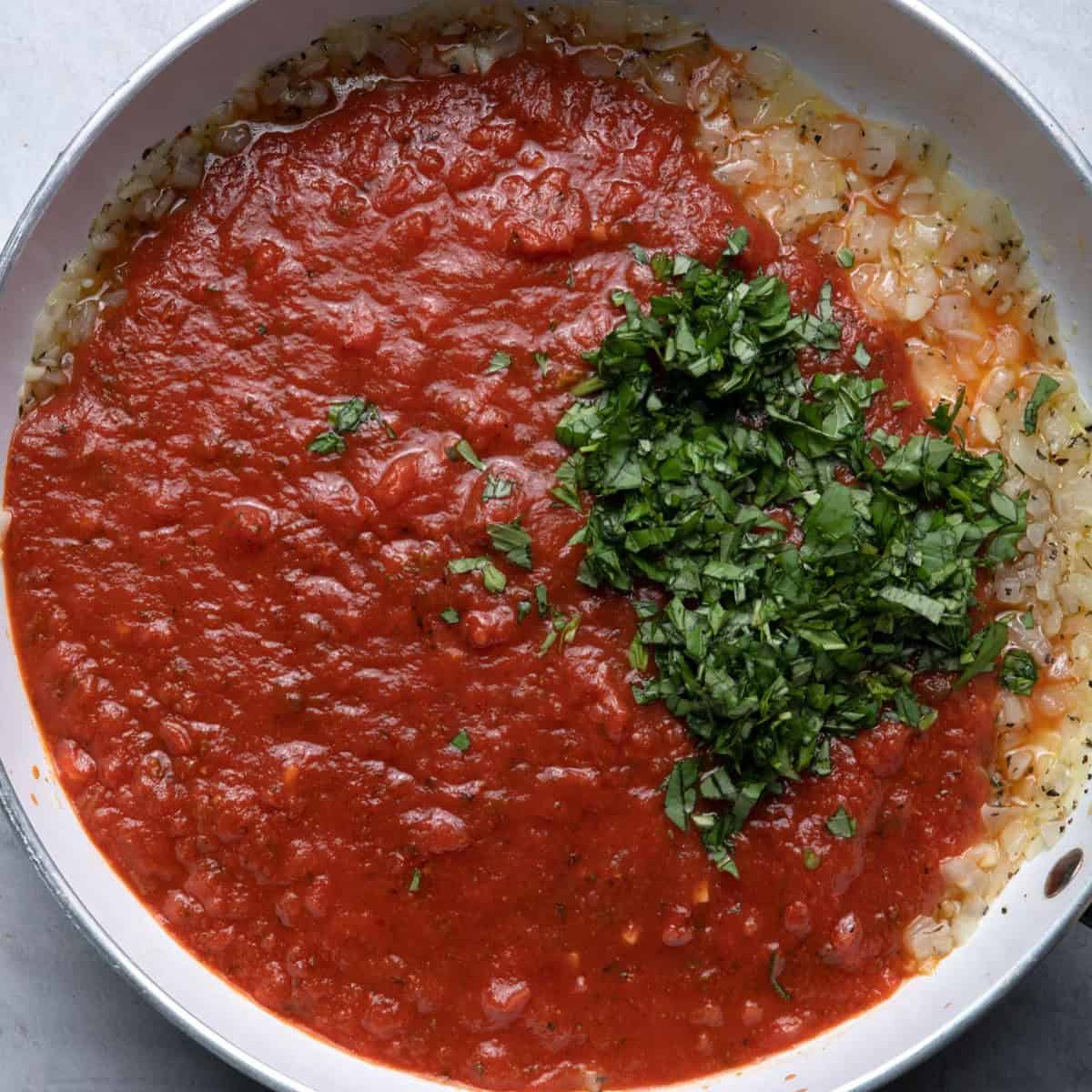 Marinara and basil added on top.