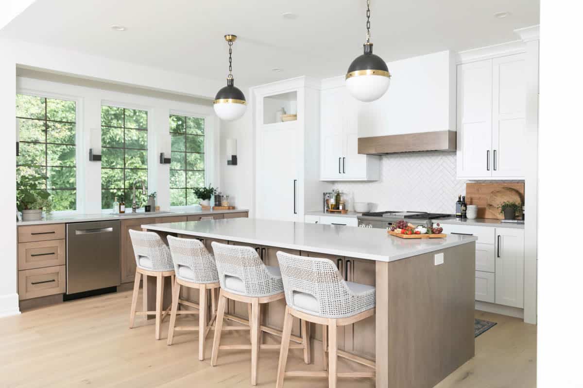 View of the kitchen with the island and 4 bar stools